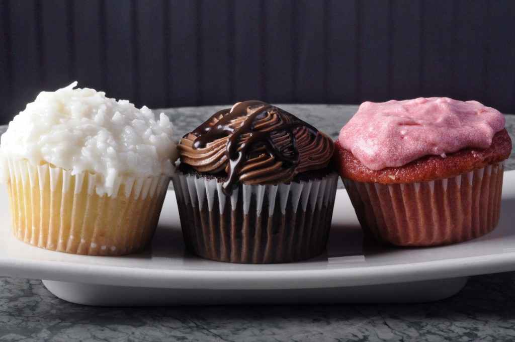 Three cupcakes on a plate